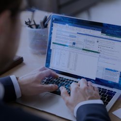 Microsoft Applications open on laptop